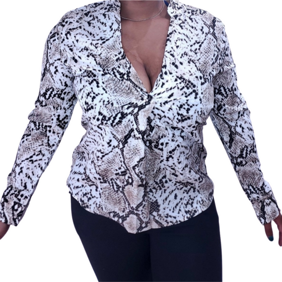 Sexy snake print for the win.  Night out with a pair of great jeans and some heels is simple but classy and just a timeless look all together.   Fit to size unless you have larger breast, defiantly size up.     Snakeskin pattern 65% Cotton 35% Cotton Cotton Blends Non-Stretch fabric Regular fit     